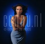 06-07-2001 Sabine de Koning at studio in Amsterdam, July 06, 2001.

[keywords]Posed, Half Length, Eyecontact, Blue Dress[/keywords]